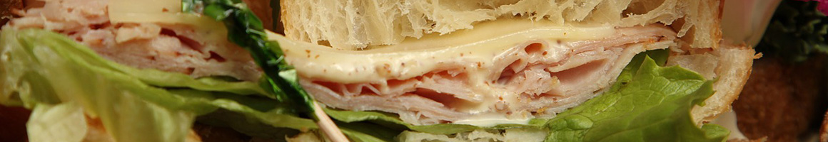 Eating Sandwich at Shamus's Sandwich Shoppe restaurant in Spokane, WA.